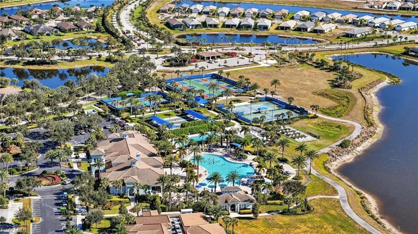 Aerial overview of property's location featuring nearby suburban area and a large body of water