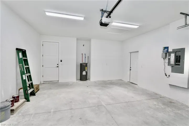 Garage, water heater and a garage door opener