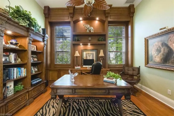 Office featuring light wood-type flooring and baseboards