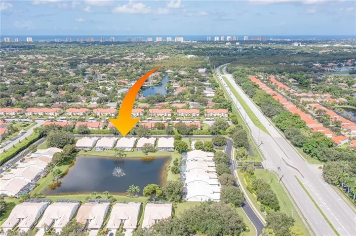 Bird's eye view with a residential view and a water view