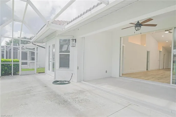 Unfurnished sunroom with french doors