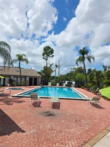 Community pool with a rectangular shape and an integrated spa