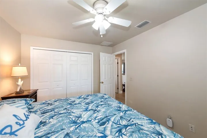 Bedroom featuring a closet and ceiling fan