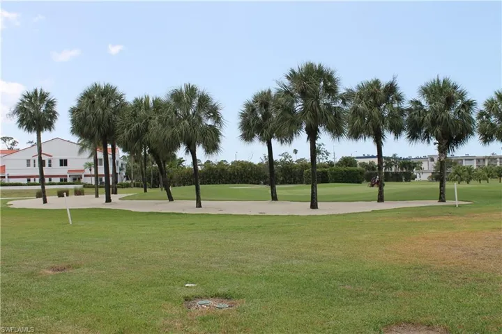 View of home's community featuring a lawn