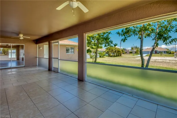 Unfurnished sunroom featuring a residential view