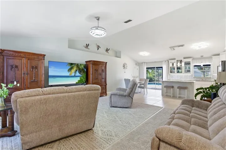 Living area featuring light tile patterned flooring