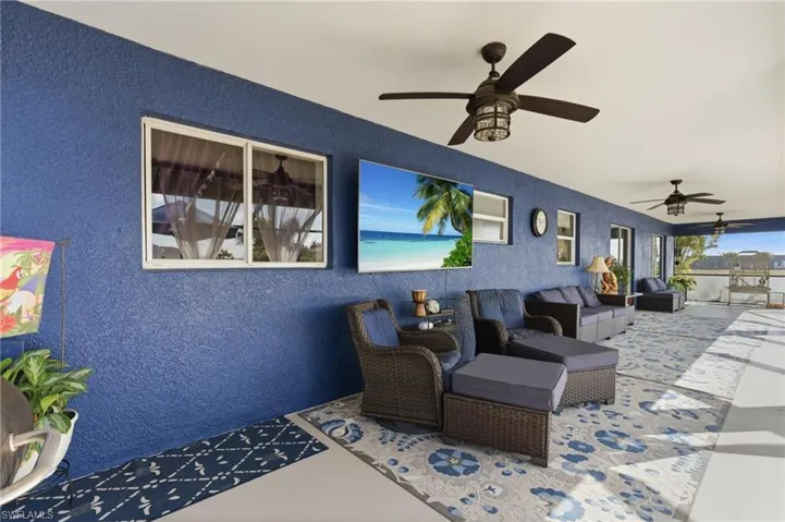 View of patio / terrace featuring ceiling fan and outdoor lounge area