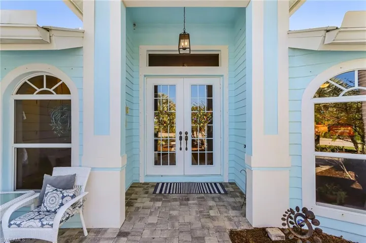 Entrance to property featuring french doors