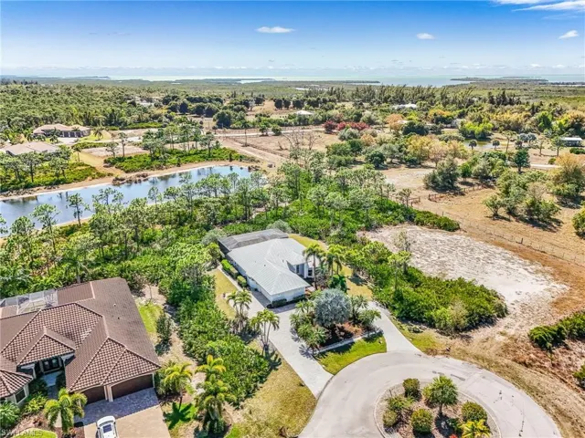 Aerial view of residential area with a large body of water