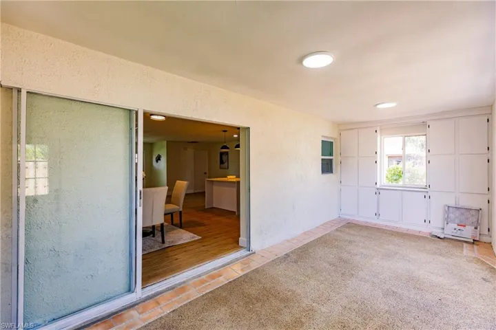 Spare room featuring light wood-type flooring