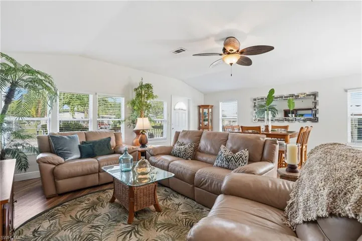 EXTEMELY SPACIOUS LIVING SPACE WITH NUMEROUS WINDOWS...LIGHT & BRIGHT!! NICELY FURNISHED...VOLUME CEILINGS..