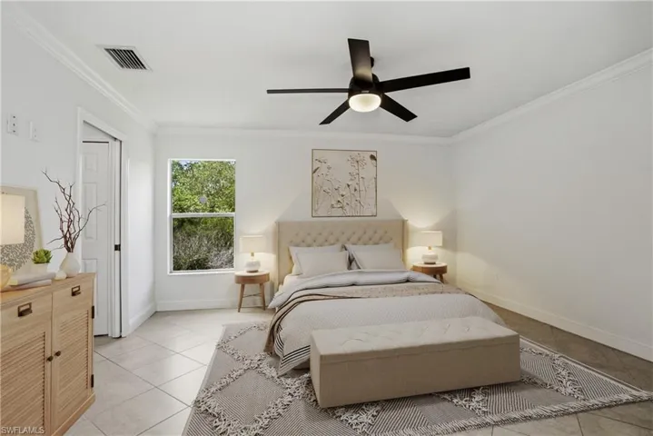 Primary Bedroom. Room has been virtually staged to showcase potential furniture design layout.
