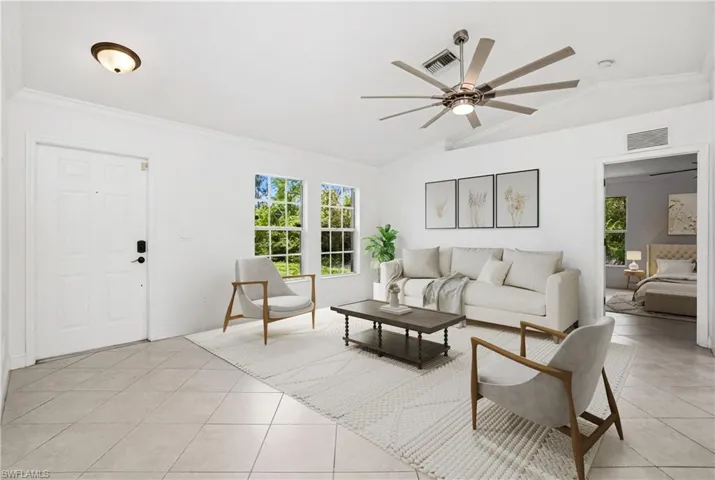 Room has been virtually staged to showcase potential furniture design layout.