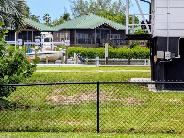 View of home's backyard with a riverview