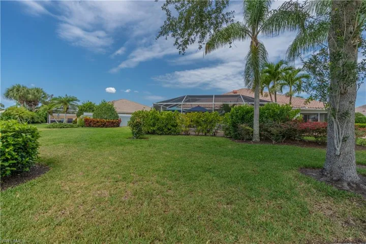 View of yard featuring a lanai
