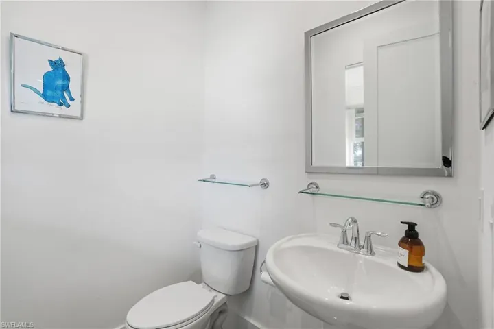 Bathroom featuring a sink and toilet