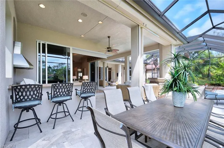 Expansive lanai with StormSmart shutters for easy of only having to bring furniture to under cover area when you are not in town during storm season.