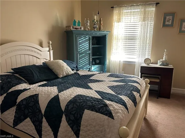 Bedroom featuring carpet flooring