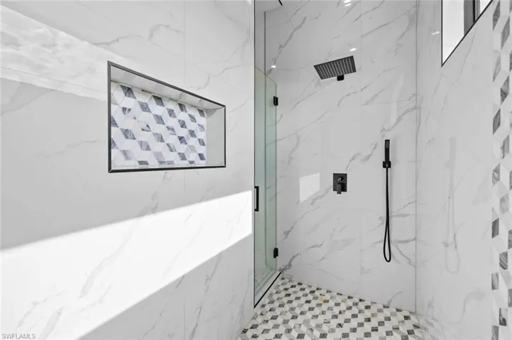 Bathroom featuring walk in shower
