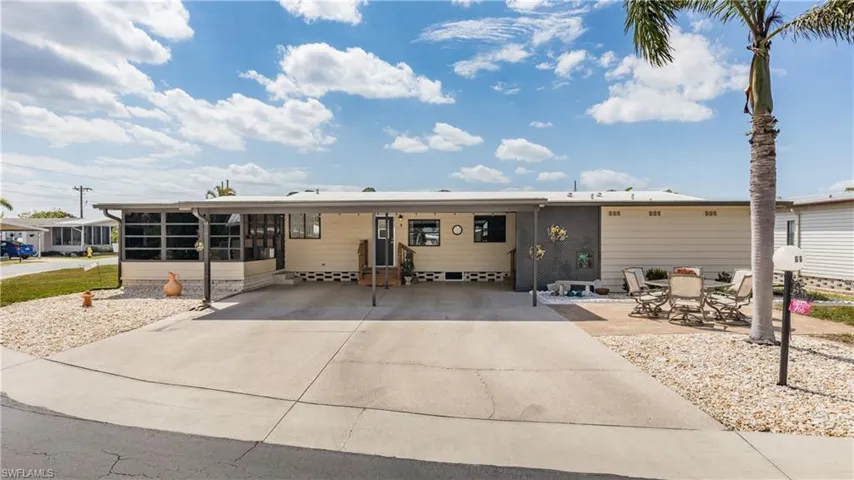 Large carport with extra driveway