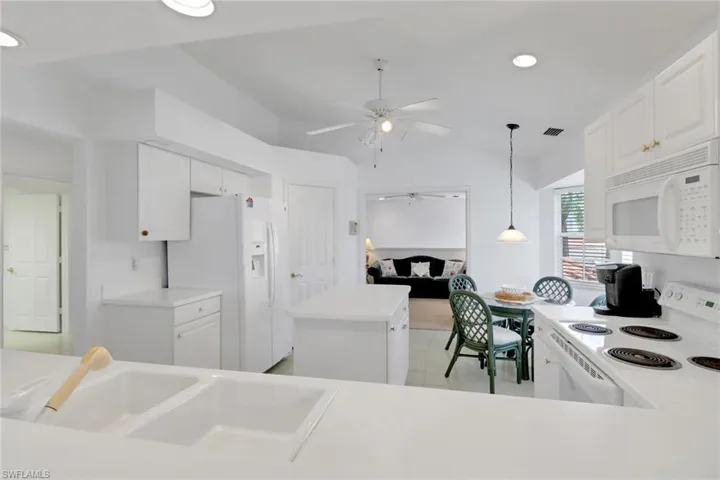 Kitchen view looking towards cozy den
