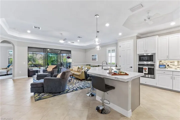 Living area/kitchen opens to pool