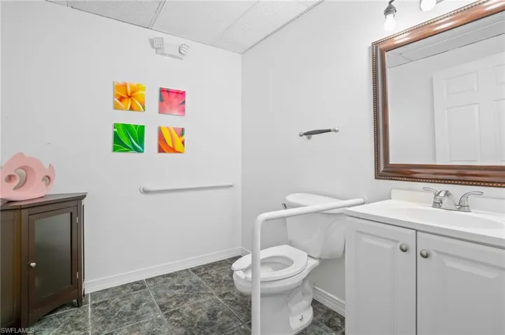 Bathroom featuring toilet and vanity
