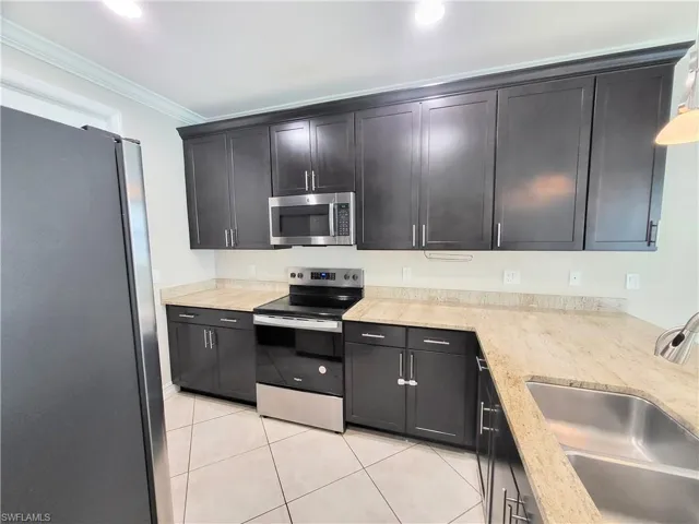 First floor, Kitchen, wood cabinets, granite countertop, stainless steel appliances, ap