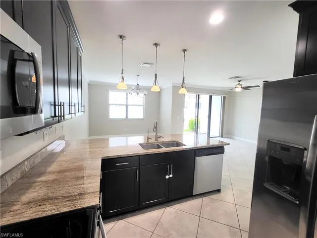 First floor, Kitchen, wood cabinets, granite countertop, stainless steel appliances, ap
