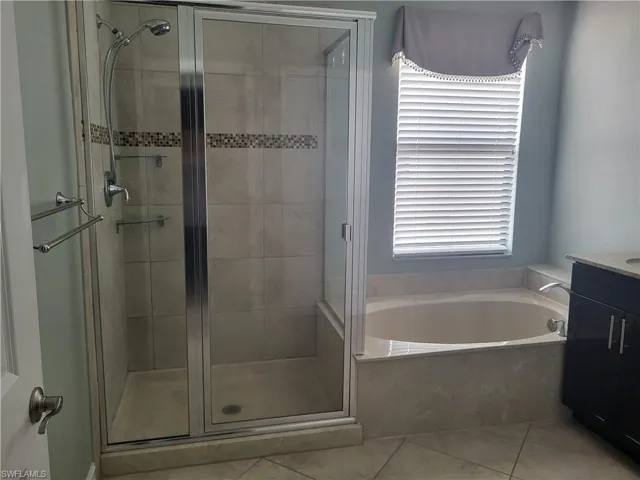 Master Bathroom with shower and tub