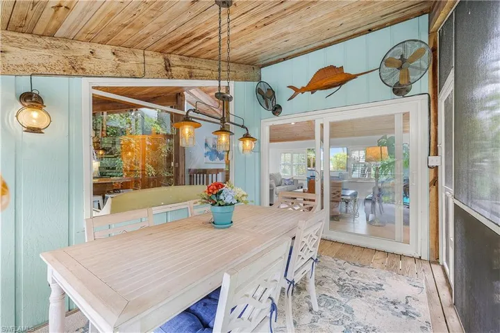 screened porch with dining