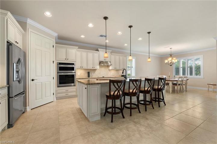 15045 Malayan Court Bonita Springs FL 34135 - Island seating for 4 and walk in pantry