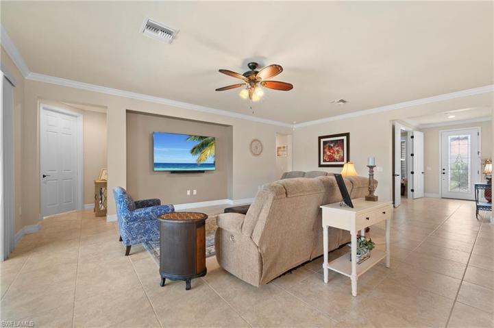 15045 Malayan Court Bonita Springs FL 34135 - Tiled living areas with floor plug for flexible furniture placement