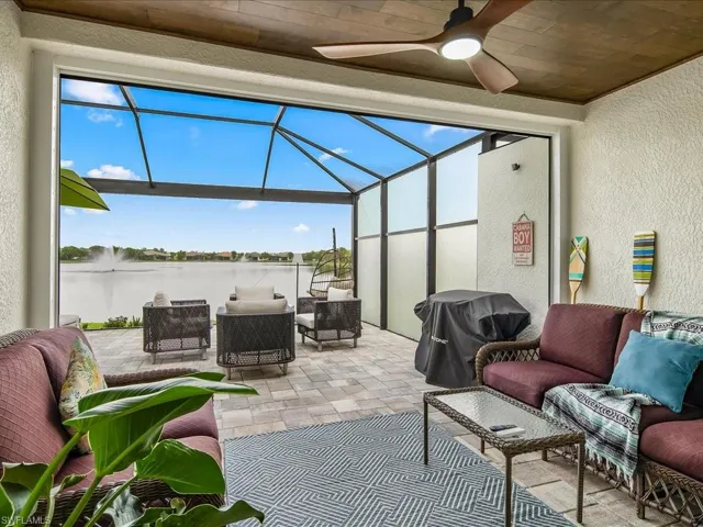 Sunroom with ceiling fan and a wealth of natural light