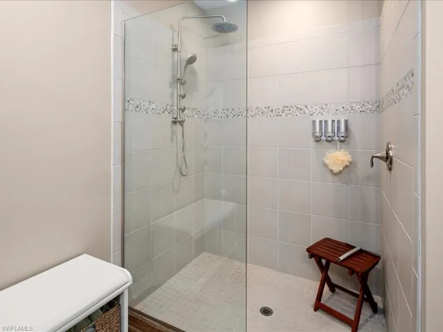 Bathroom with tiled shower