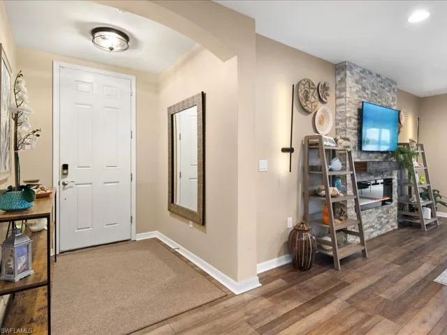 Entryway featuring dark hardwood / wood-style flooring