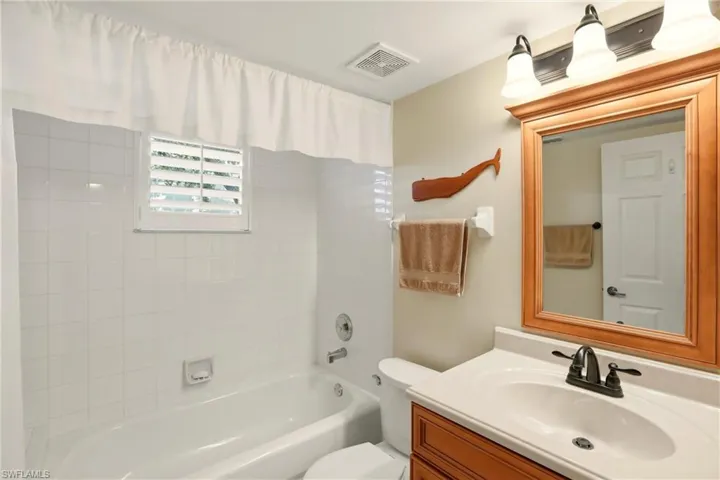 Full bathroom with bathtub / shower combination and vanity