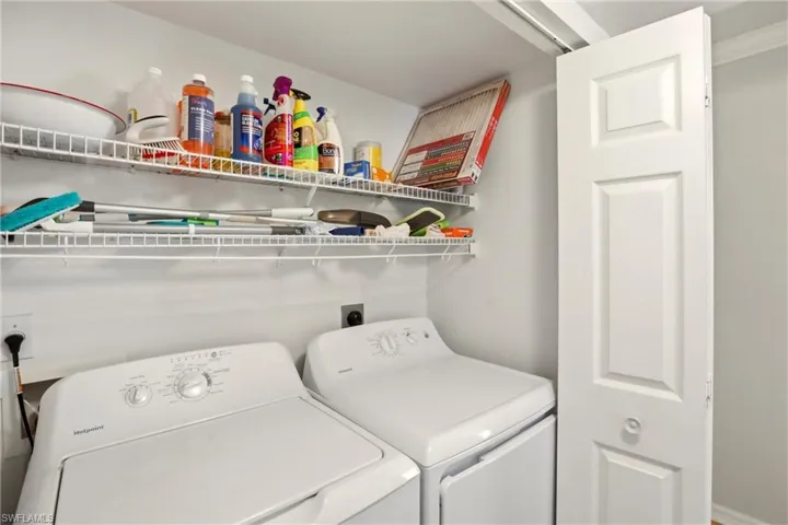 Laundry room featuring independent washer and dryer