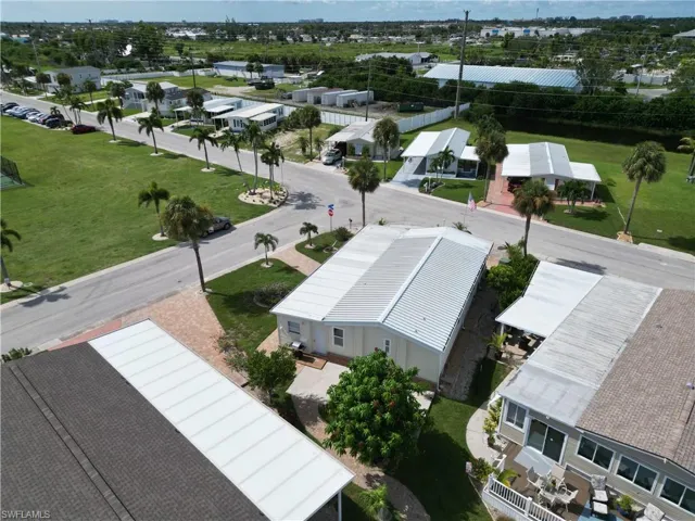 Located across from large grassy area.