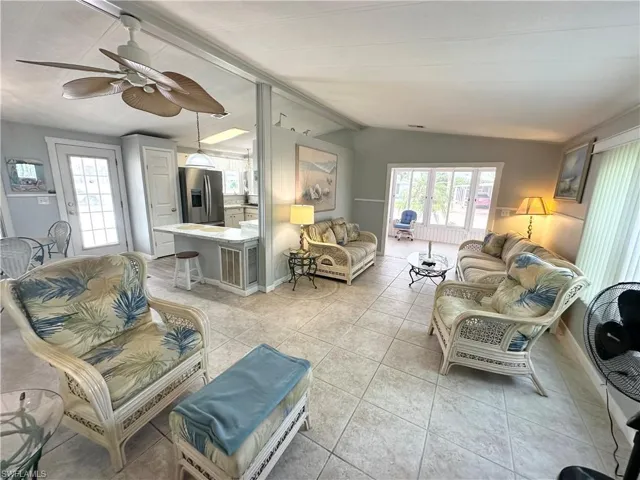 Living room looking toward Florida room, dining and kitchen