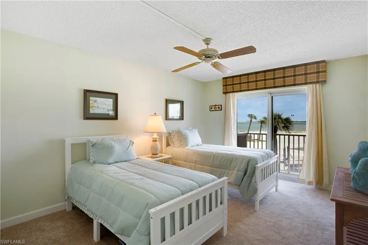 Spacious guest bedroom, walk in closet, & newer carpet.