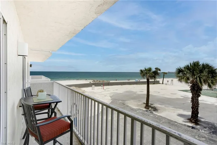 Back balcony is shared by both bedrooms.  Fantastic beach views...parking lot under repair.