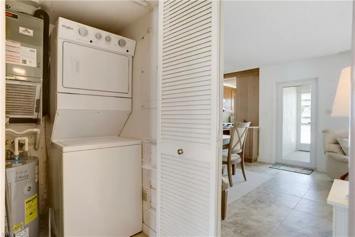 Laudry with stackable washer/dryer.