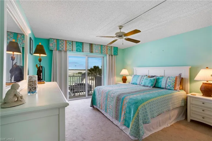 Spacious Primary Bedroom with beachy vibes!