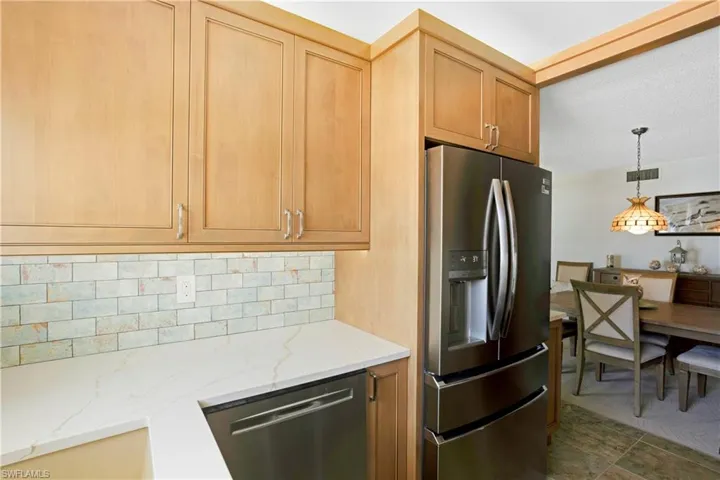 The kitchen flows in the dining room.