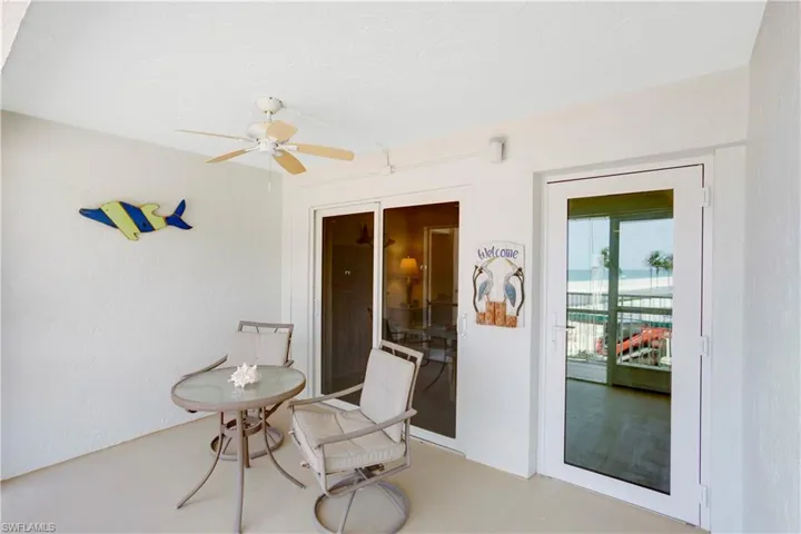 Screened front balcony with Glass Impact Entry Door!