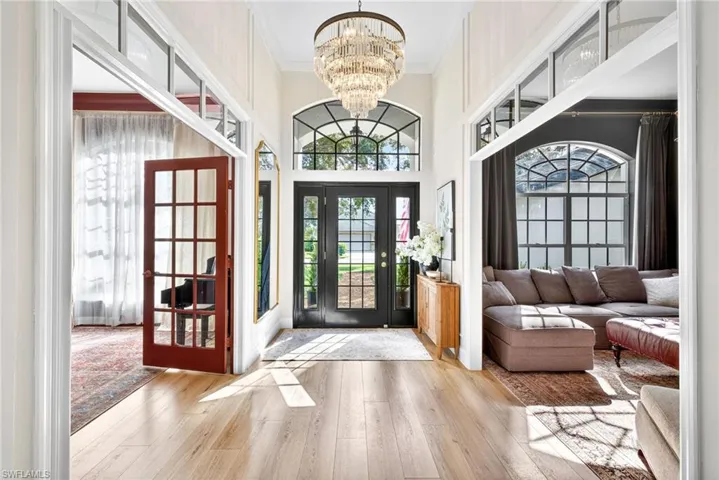 Entryway with crown moulding and beautiful views