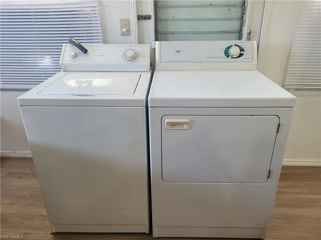 washer and dryer are inside but go outside with plumbing by hot water heater