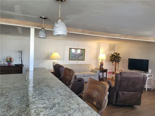 Living room featuring hardwood / wood-style flooring