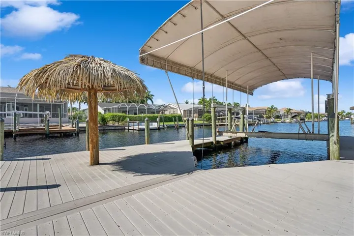 Dock - Tiki Hut- 20K Boat Lift with Canopy -Composite Wrap Around Dock